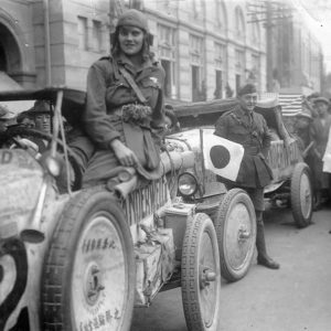 A person riding a vehicle