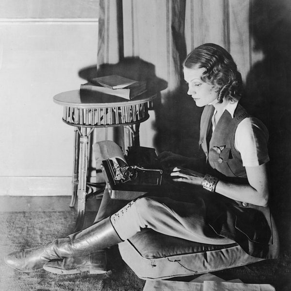 Aloha Wanderwell typing on Remington