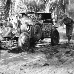 Pushing Wanderwell Model-T out of Mud