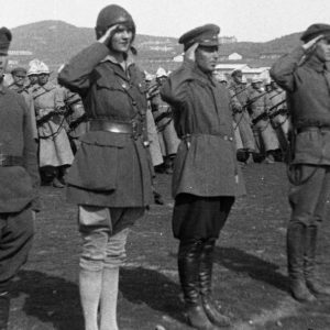 Aloha Wanderwell with Soldiers Saluting